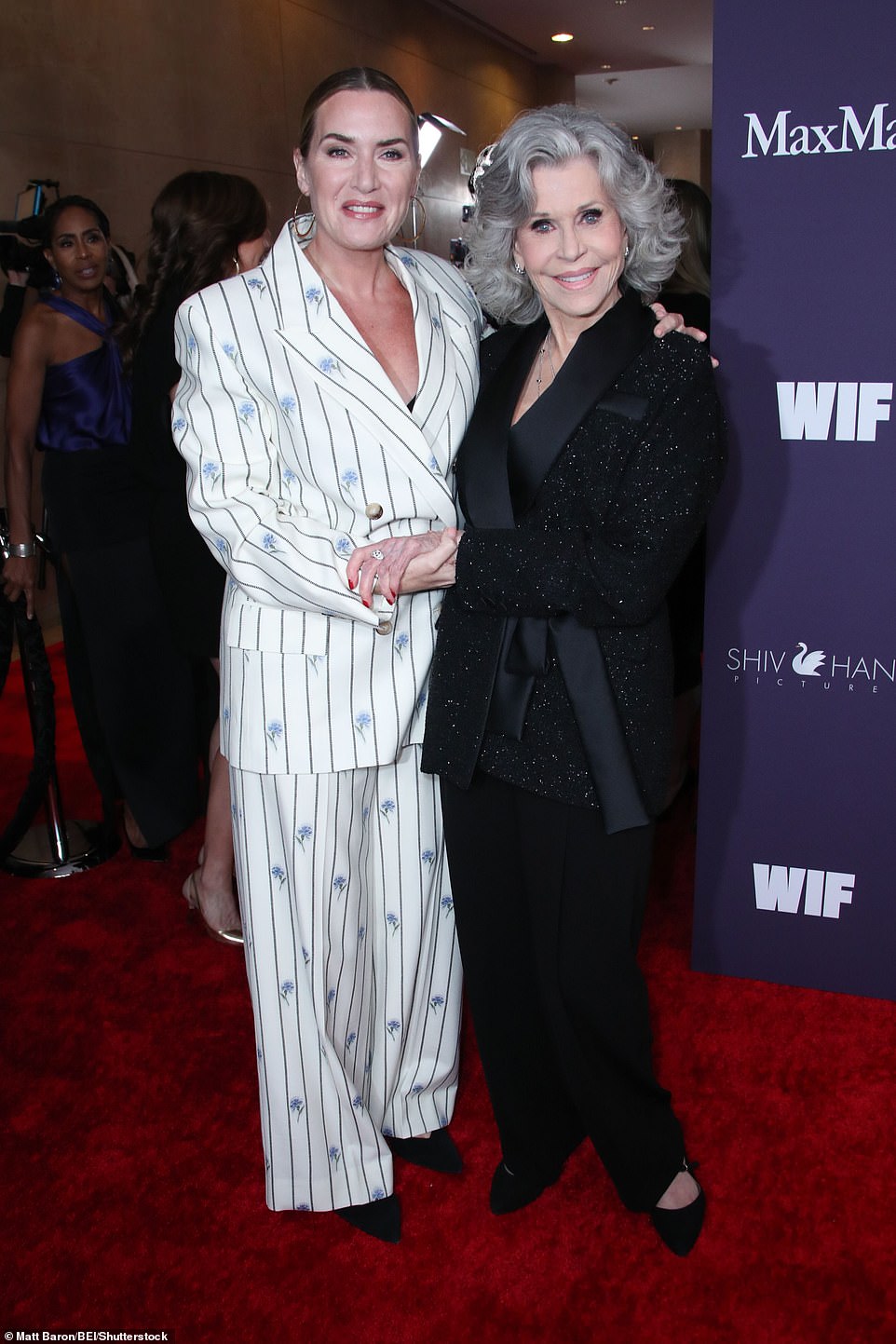 He posed with Jane Fonda on the red carpet