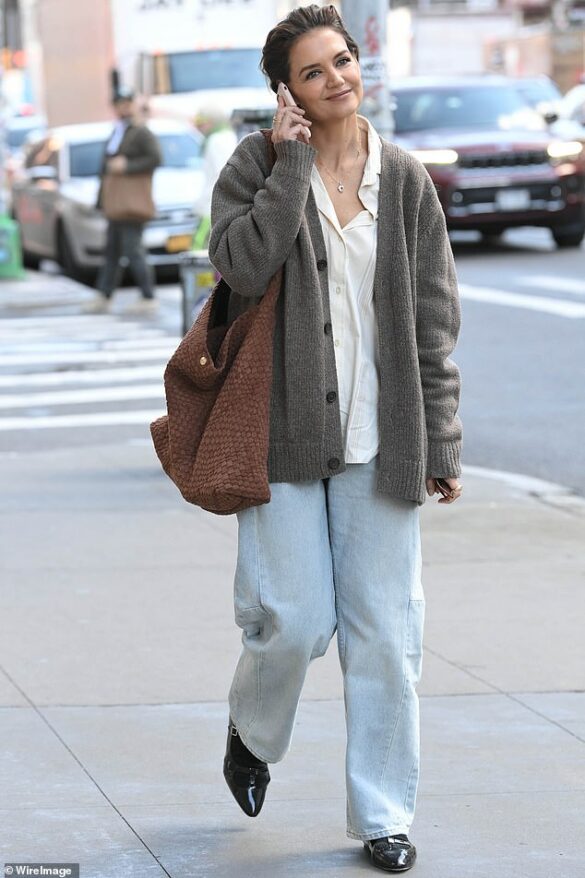 Katie Holmes Enjoys Cheery Phone Call In NYC Ahead Of Opening Night In