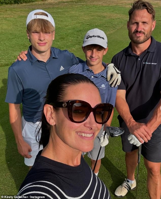 Last month, Kirsty opened up about how she fell in love with her partner Darren after they bonded over being single parents (pictured with their two sons Oscar and Jude).