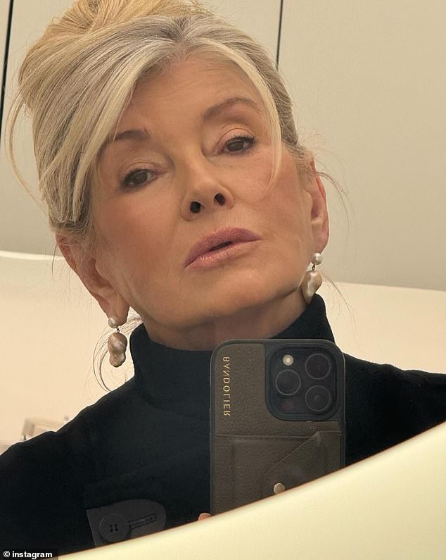 She looked timeless in a black turtleneck as she took a mirror selfie.