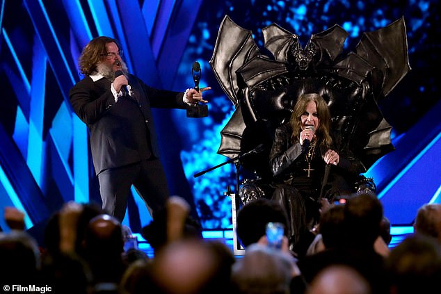 Ozzy, who is battling Parkinson's disease, took the stage on a throne adorned with bat wings.