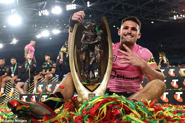 Nathan Cleary (pictured, celebrating Penrith's grand final victory) will call off surgery so he can spend time with teammate Mary Fowler in the UK.