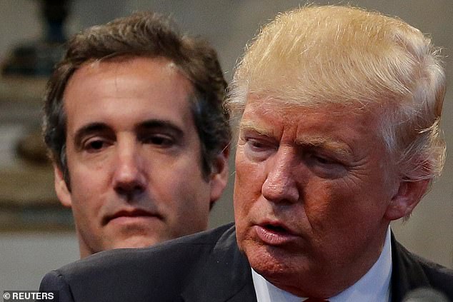 Trump and Cohen in happier times, seen here together during a campaign stop in Cleveland Heights, Ohio, in September 2016. Cohen worked for Trump for 10 years.