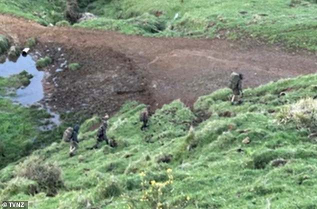 Phillips and his three children were filmed hiking in camouflage gear on a remote coastal farm near Marokopa on Oct. 3 by a pair of teenage hog hunters.