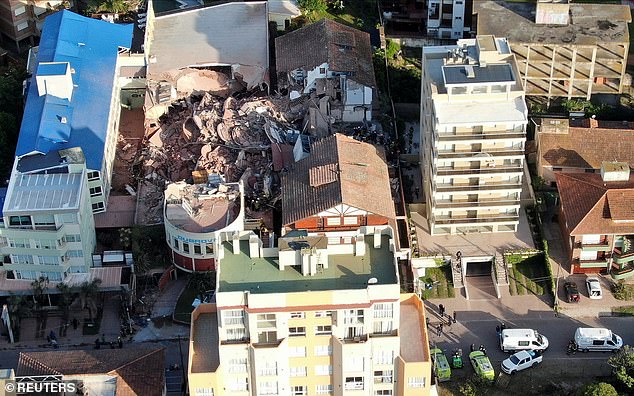 A drone view shows the remains of the Dubrovnik hotel after it collapsed in the coastal town of Villa Gesell, Buenos Aires.