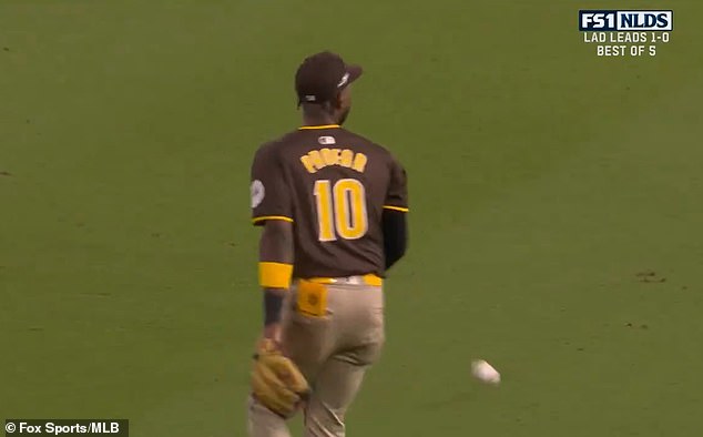 A ball, thrown by a fan inside Dodger Stadium, could be seen landing near the Padres star.