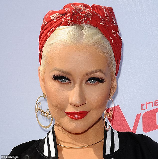 Dr. Brian Reagan, a plastic surgeon based in San Diego, California, noted that she does not have the typical folds between her nose and mouth, and suggested that filler might be involved. He made this comment while referring to a 2016 photo of Aguilera dressed in a Rosie the Riveter-inspired outfit.