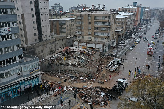 Pictured: Aerial view of a destroyed building in Gaziantep, southern Turkey, 2023. The earthquake, which could be the largest ever recorded in Turkey, was centered north of Gaziantep, Turkey, which is about 60 miles from the border with Syria and has a population of about 2 million