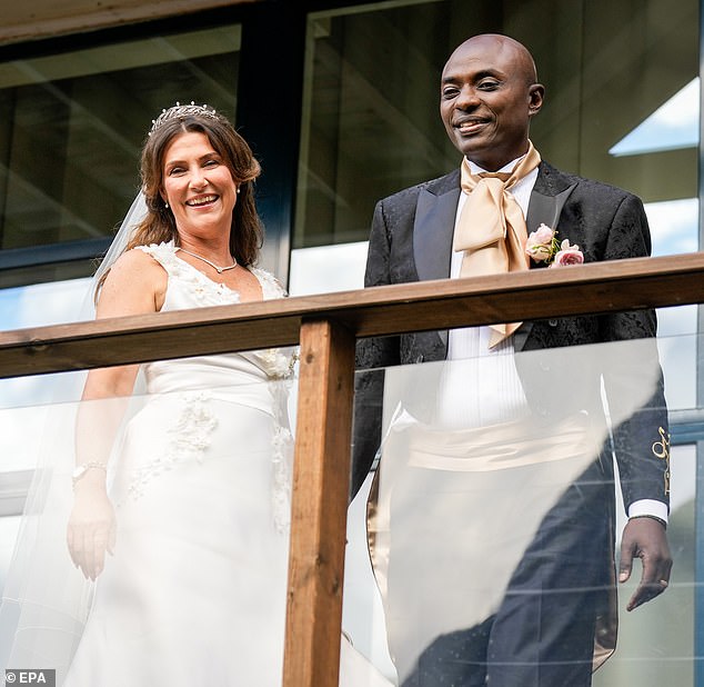 Princess Martha and her husband Durek greeted people from a balcony.