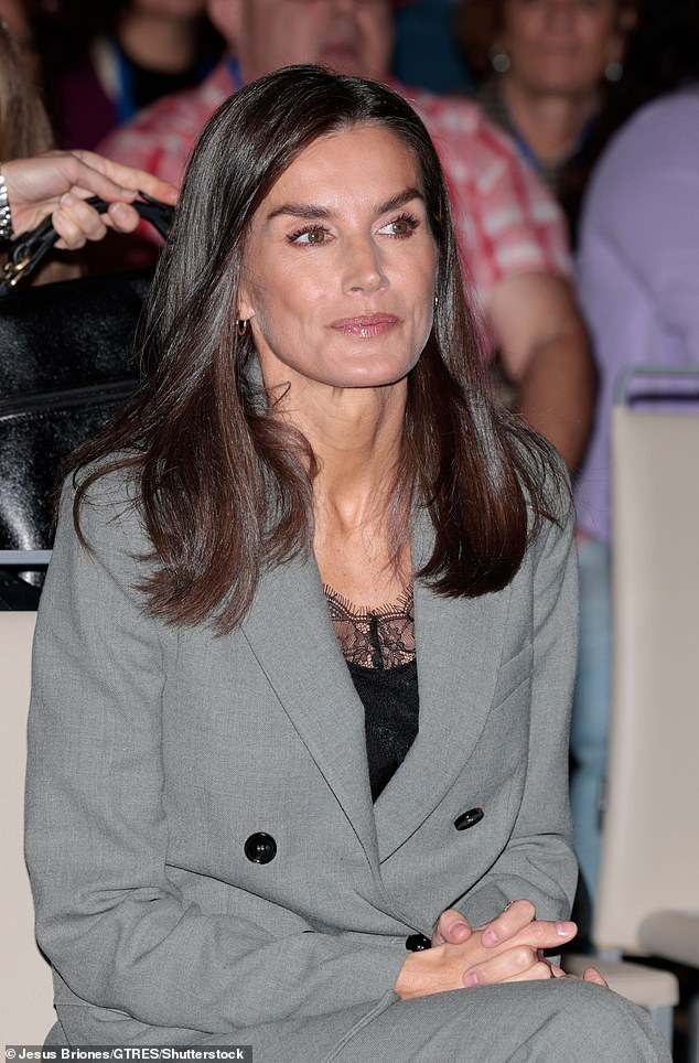 The monarch, 52, opted for an elegant gray jacket and matching pants for the annual event held in the Spanish capital.