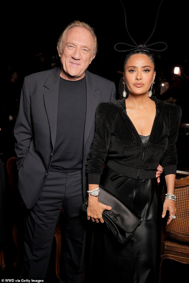 Some tweeters have suggested that Salma was simply acting out her role as the boss's wife when she tried to guide Nicole through the photos. The actress is married to François-Henri Pinault, CEO of Kering, Balenciaga's parent company (pictured at the show)