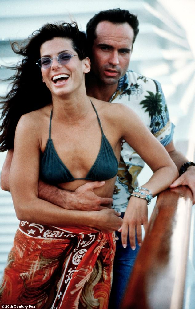 Reeves declined to return for the 1997 Speed ​​sequel, Speed ​​2: Cruise Control, leaving Bullock to direct the film with Jason Patric; She is seen in a photograph with Patric.