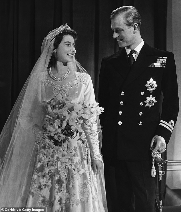 Queen Elizabeth II with her husband Philip, Duke of Edinburgh, on their wedding day, 20 November 1947.