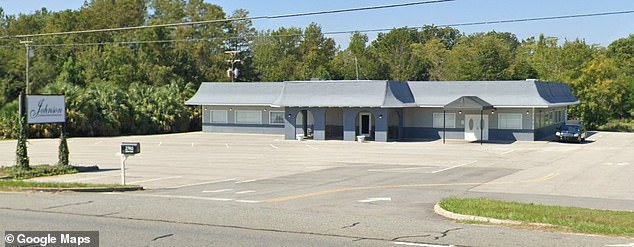 On Sunday, the owner of a Douglas funeral home was charged with 17 counts of abuse of a corpse after a gruesome discovery of 18 decomposing bodies in a cooler inside the facility. Pictured: Johnson Funeral & Cremation Services in Douglas, Georgia