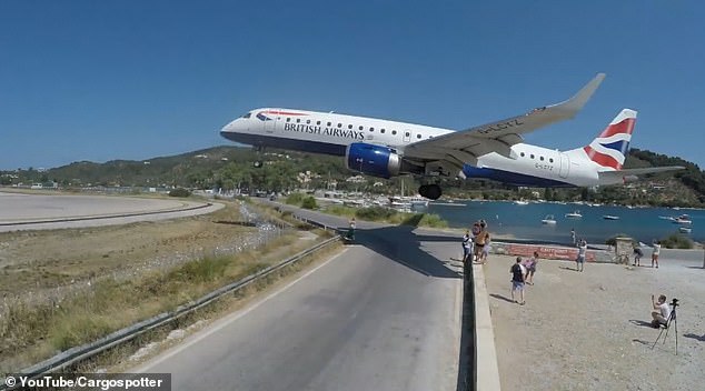 A BA flight landing in Skiathos. The Greek island's airport is very difficult to land in and has been the scene of many spectacular landings over the years.