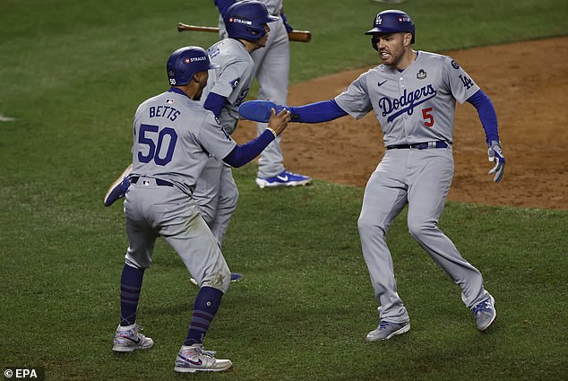 Freddie Freeman and Mookie Betts celebrate during Dodgers' remarkable comeback