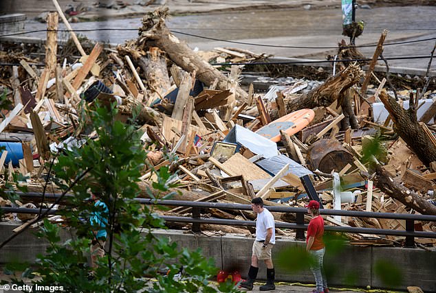 In Lake Lure, North Carolina, approximately six feet of debris piled up on a bridge from Lake Lure to Chimney Rock, blocking access.