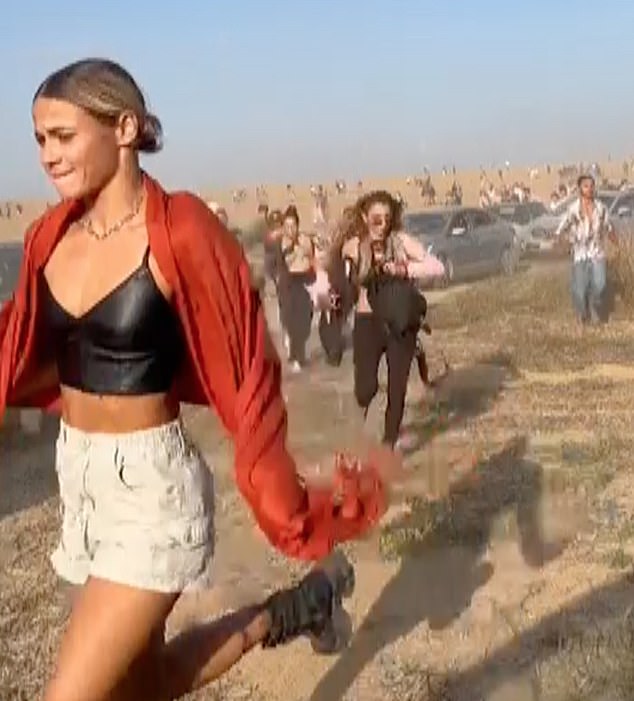 Festival goer Vlada Patapov (left) is seen fleeing the scene of the Nova festival massacre on October 7, where Hamas gunmen opened fire on revelers, killing hundreds.