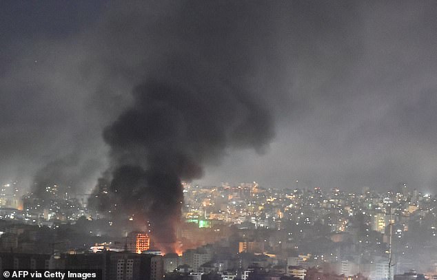 Smoke rises from the site of an Israeli airstrike that targeted a neighborhood in the southern suburb of Beirut early on October 3, 2024.