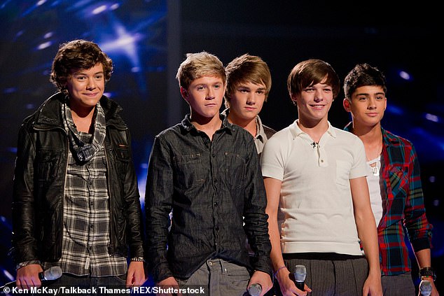 Liam (centre) was just 16 years old when he became one fifth of One Direction in 2010.