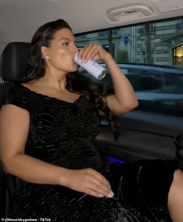 In the TikTok video, the Victoria's Secret model went about her busy Paris Fashion Week while drinking the canned drink.