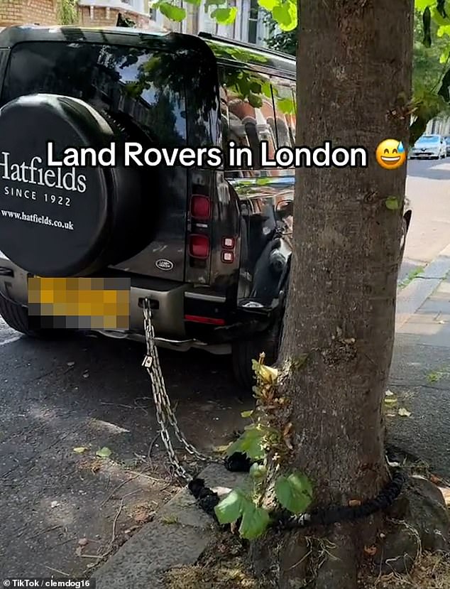 The car was chained to a nearby tree with a sturdy chain and locks similar to those on a chained bicycle.