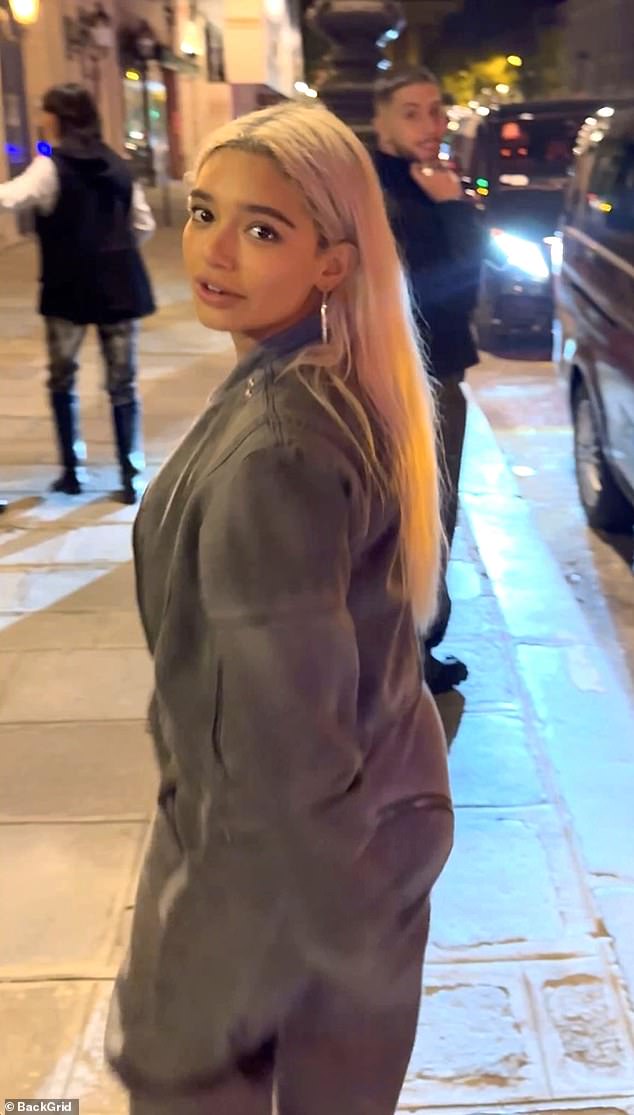 The Houston-born model, 25, wore a luxurious gray tracksuit while stepping out.