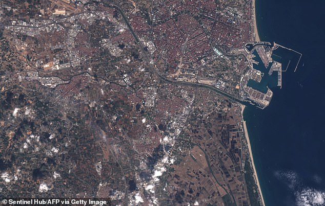 BEFORE: Satellite image shows Valencia on October 13, before the deluge of rain