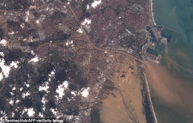 AFTER: Satellite image shows severe flooding in Valencia on October 30 after heavy rain