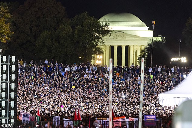 Supporters could be seen stretching outside the security perimeter across the National Mall, with the Jefferson Memorial in the background.