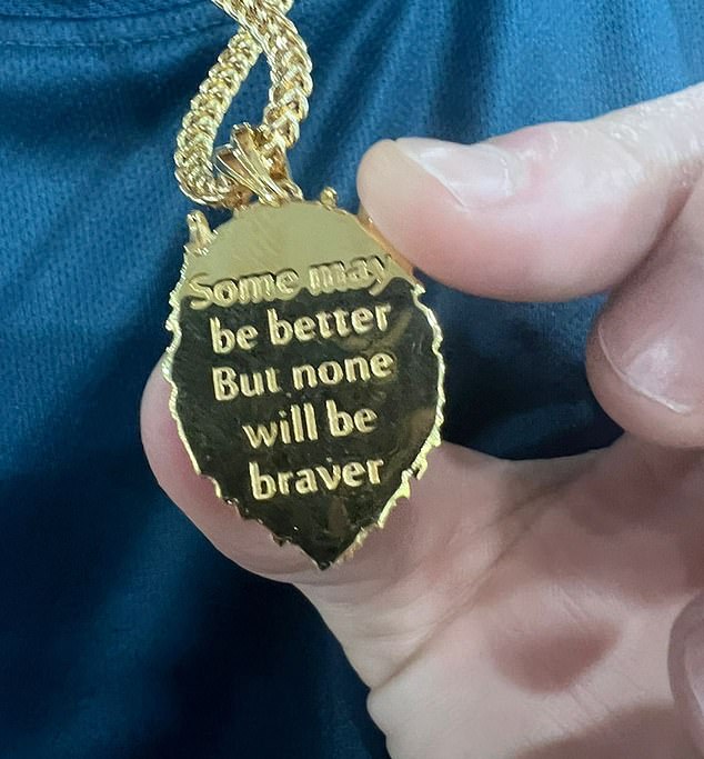 The back of the lion's necklace was engraved: 'Some may be better, but none will be braver'