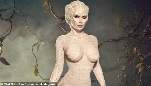 Kim makes it clear in her caption that she is an 'albino alligator' created by artist Alexis Stone.