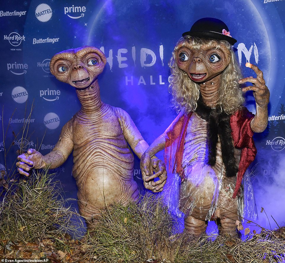 On October 31, the supermodel, 51, made her grand arrival at her famous annual Halloween soirée alongside the musician, 35, dressed as the alien from the 1982 cult classic film, ET the Extra-Terrestrial.