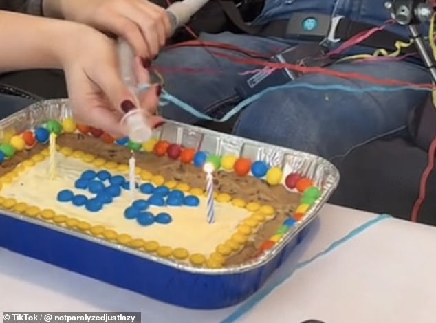 Thousands of viewers liked the short clip, which showed the 25-year-old celebrating her birthday with a cake and candles (pictured).