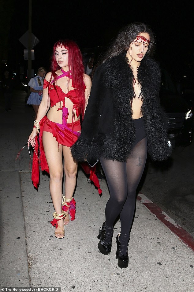 Arriving at celebrity hotspot Chateau Marmont in Hollywood, the singer, 32, was joined by Rosalía, also 32, who opted for bloody makeup.