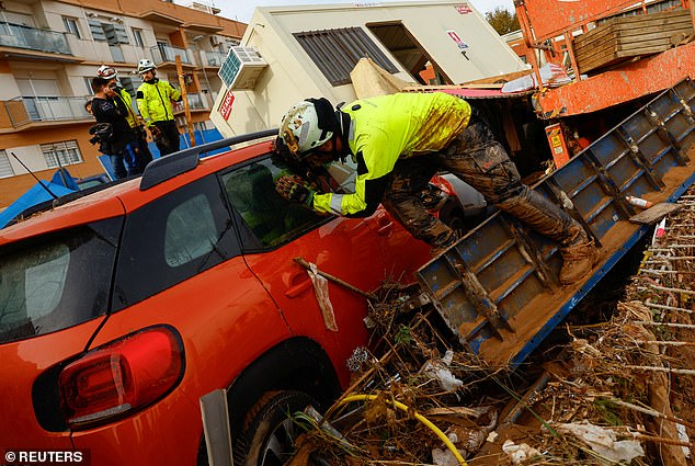 Search and rescue teams have begun searching for survivors (pictured), 155 people have already been confirmed dead