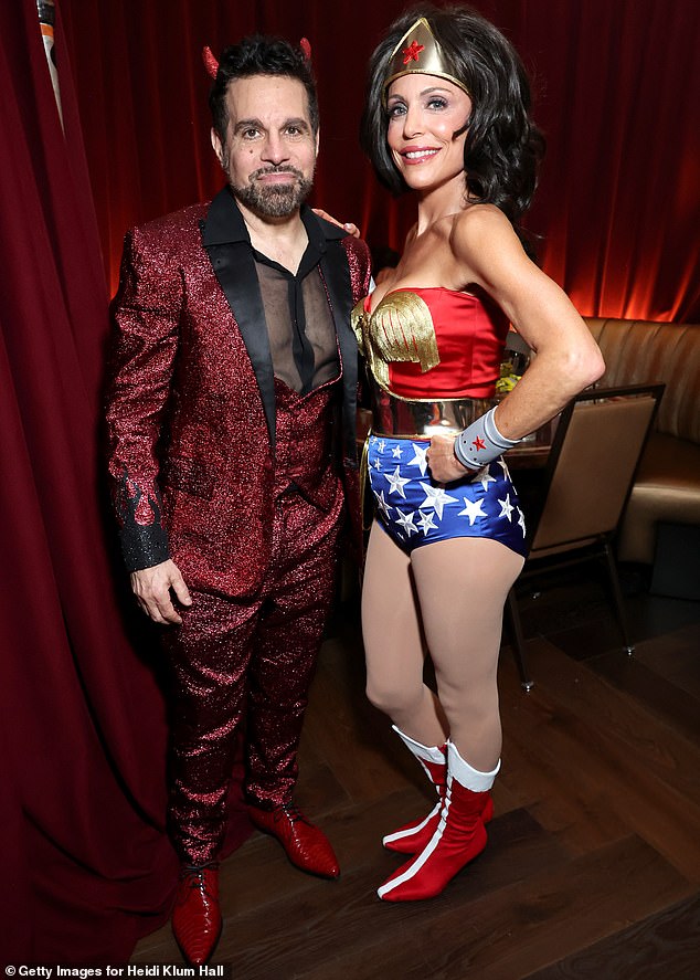 While strolling through the party, Bethenny could be seen rubbing shoulders with other stars, including comedian Mario Cantone, who was dressed as the sexy Satan.