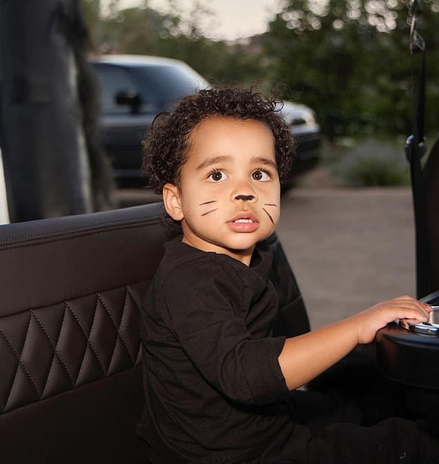 Here you can see the child inside the stroller that had black seats