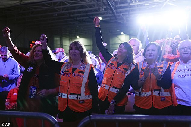 Dozens of supporters showed up in the type of high-visibility vests worn by healthcare workers, after Trump donned one to troll Joe Biden after he appeared to call 