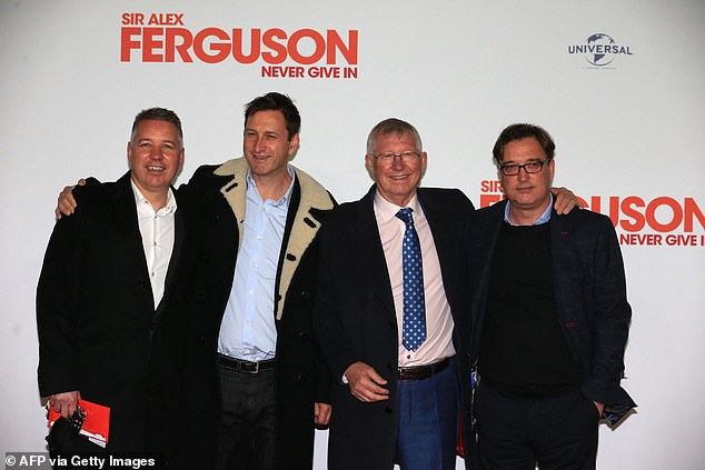 His sons Darren (left), Mark (second left) and Jason (right) are listed as having significant control of the business.