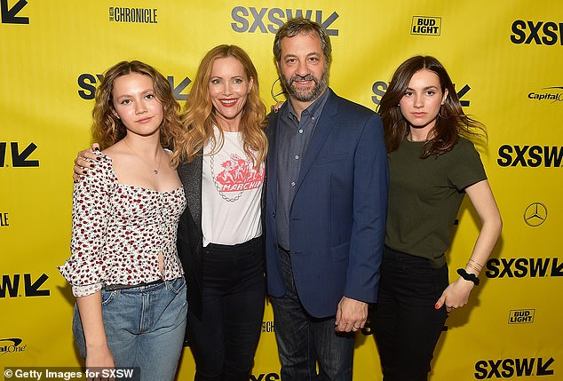 Iris with her sister Maude and parents Judd Apatow and Leslie Mann; photographed in 2018