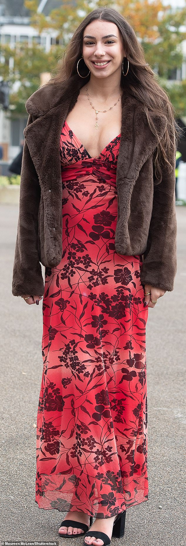 STYLISH: This attendee made sure her ensemble was stylish and practical, accessorizing her dress with a faux fur jacket.