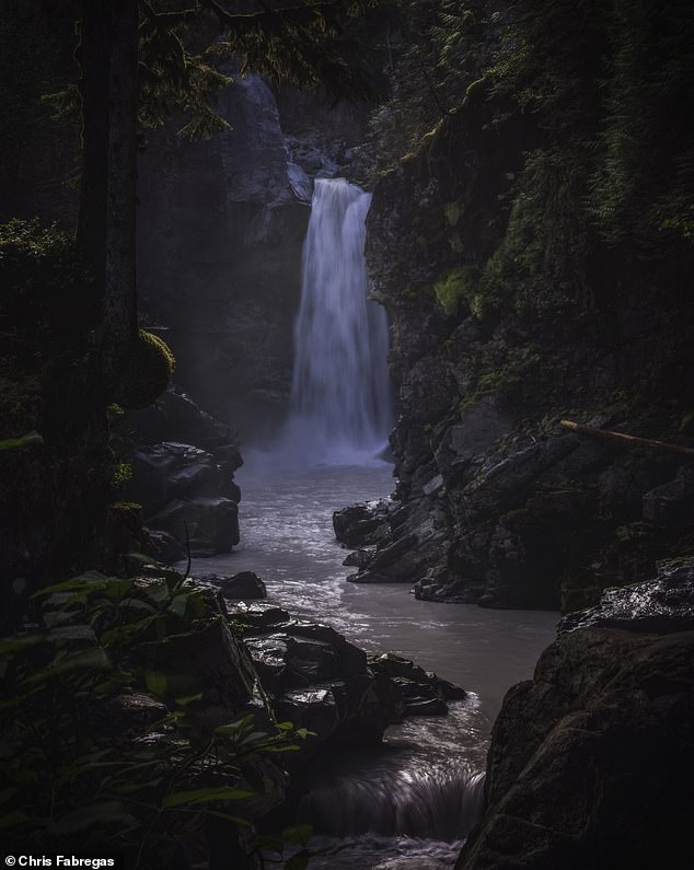 Chris is known for capturing the beauty of nature, but also claims to have experienced some paranormal events while traveling over the years (pictured at British Columbia waterfall).