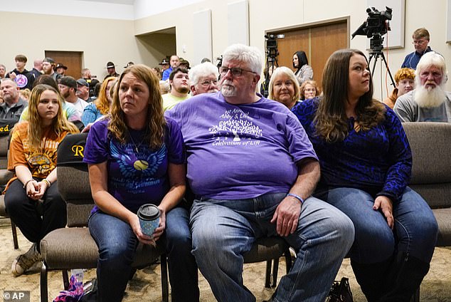 Family members of Liberty German and Abigail Williams listen as Indiana State Police Superintendent Doug Carter announces during a news conference in Delphi, Ind., Monday, Oct. 31, 2022, the arrest of Richard Allen, 50 , for the murder of two teenagers. during a 2017 hiking trip in northern Indiana