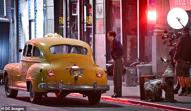 The Call Me By My Name star carried a black doctor-style bag in the snaps and hopped into a vintage taxi as cameras rolled.