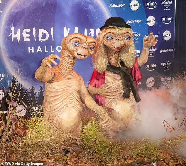 It comes after Heidi stunned in an incredible ET costume, alongside Tom (left), who sported a matching look for their annual Halloween party.