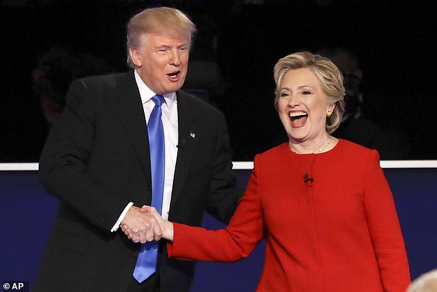 Republican presidential candidate Donald Trump and Democratic presidential candidate Hillary Clinton shake hands after the presidential debate in Hempstead, New York, on September 26, 2016.