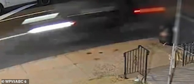 Disturbing surveillance footage shows what police describe as a dark-colored SUV speeding away from the scene.