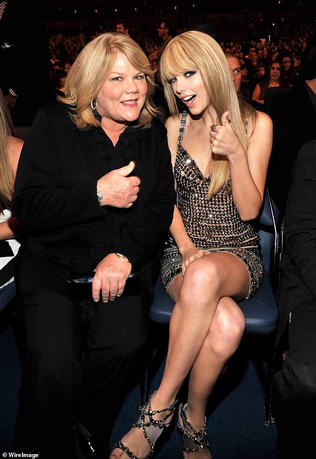 Taylor Swift and her mother Andrea pictured at the 2010 American Music Awards. One of Taylor's first managers praised Andrea for her 