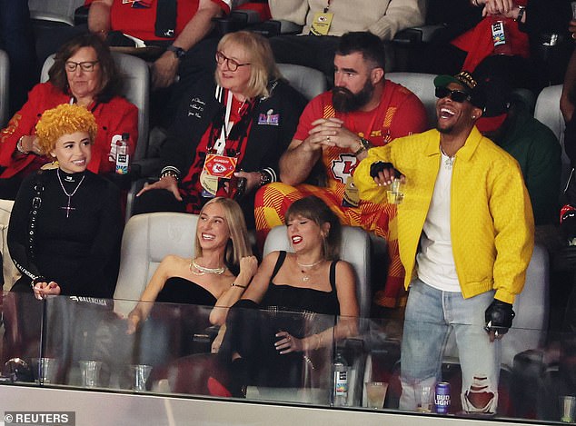 Jason photographed at last season's Super Bowl, cheering on Travis in the same suite as Swift.